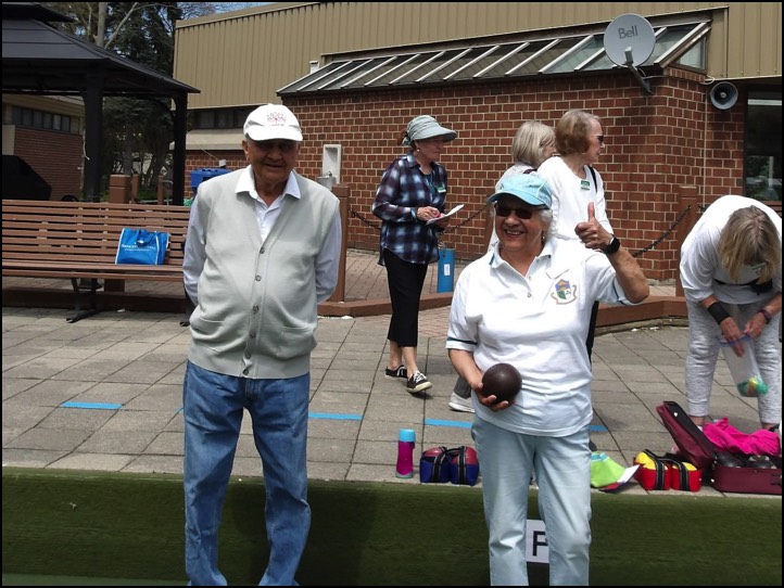 Julia and Satish give the thumbs up during opening day at Willowdale Lawn Bowling Club. 